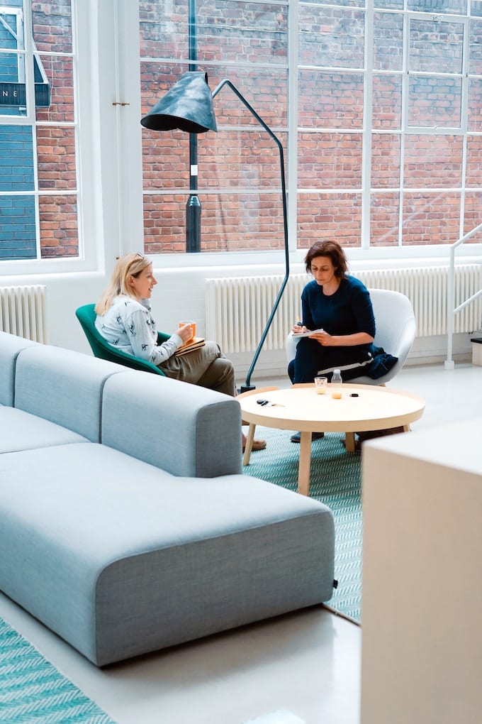 two women talking to each other