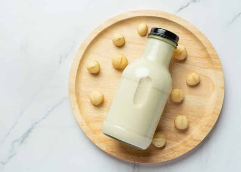 jar of macadamia nut milk on a tray.