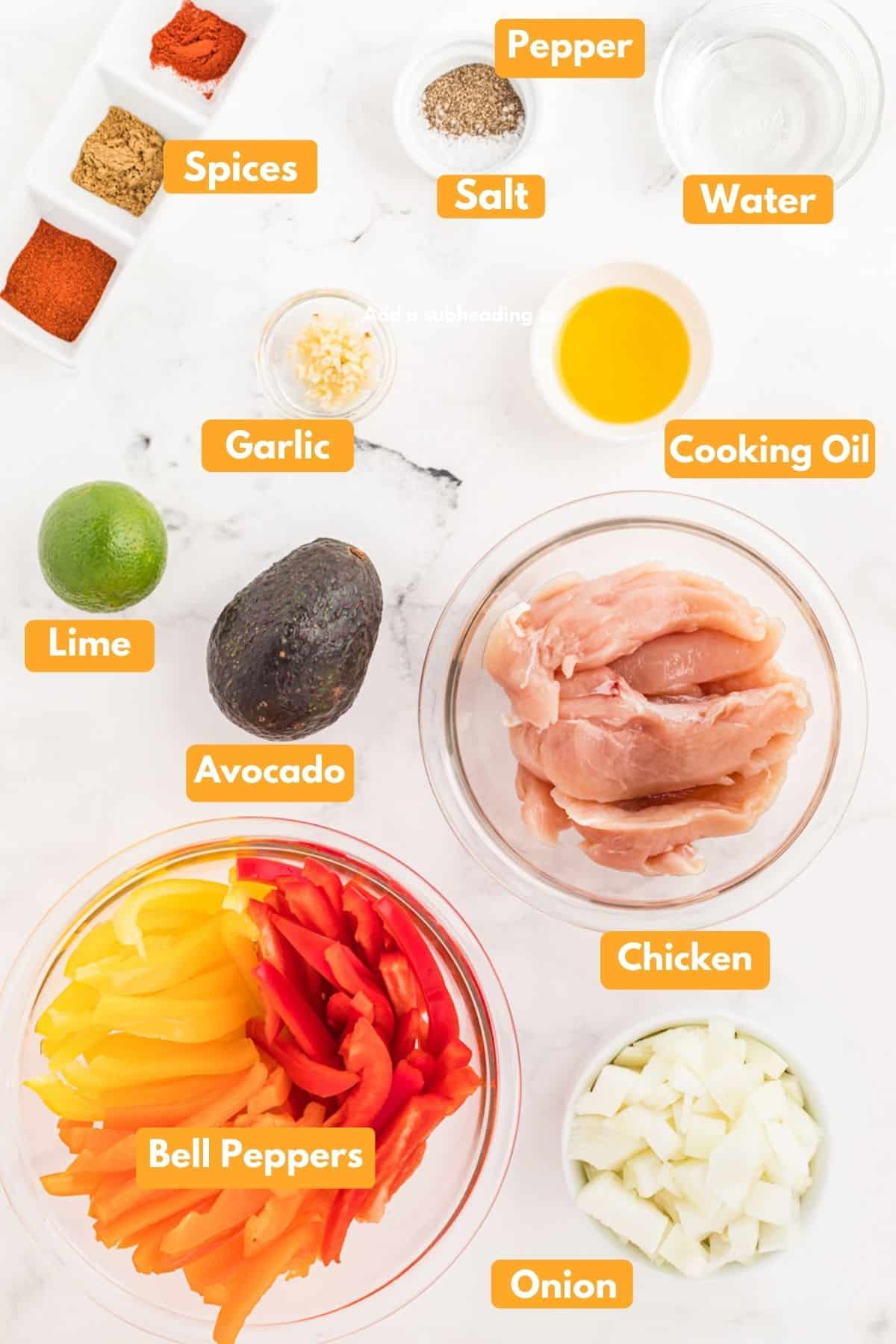 All the ingredients for fajitas laid out in bowls