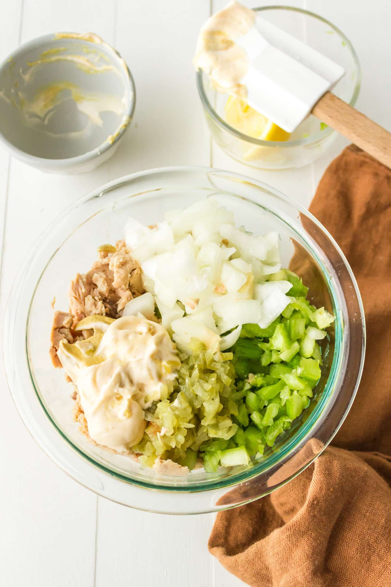 Ingredients for salmon salad in a bowl.