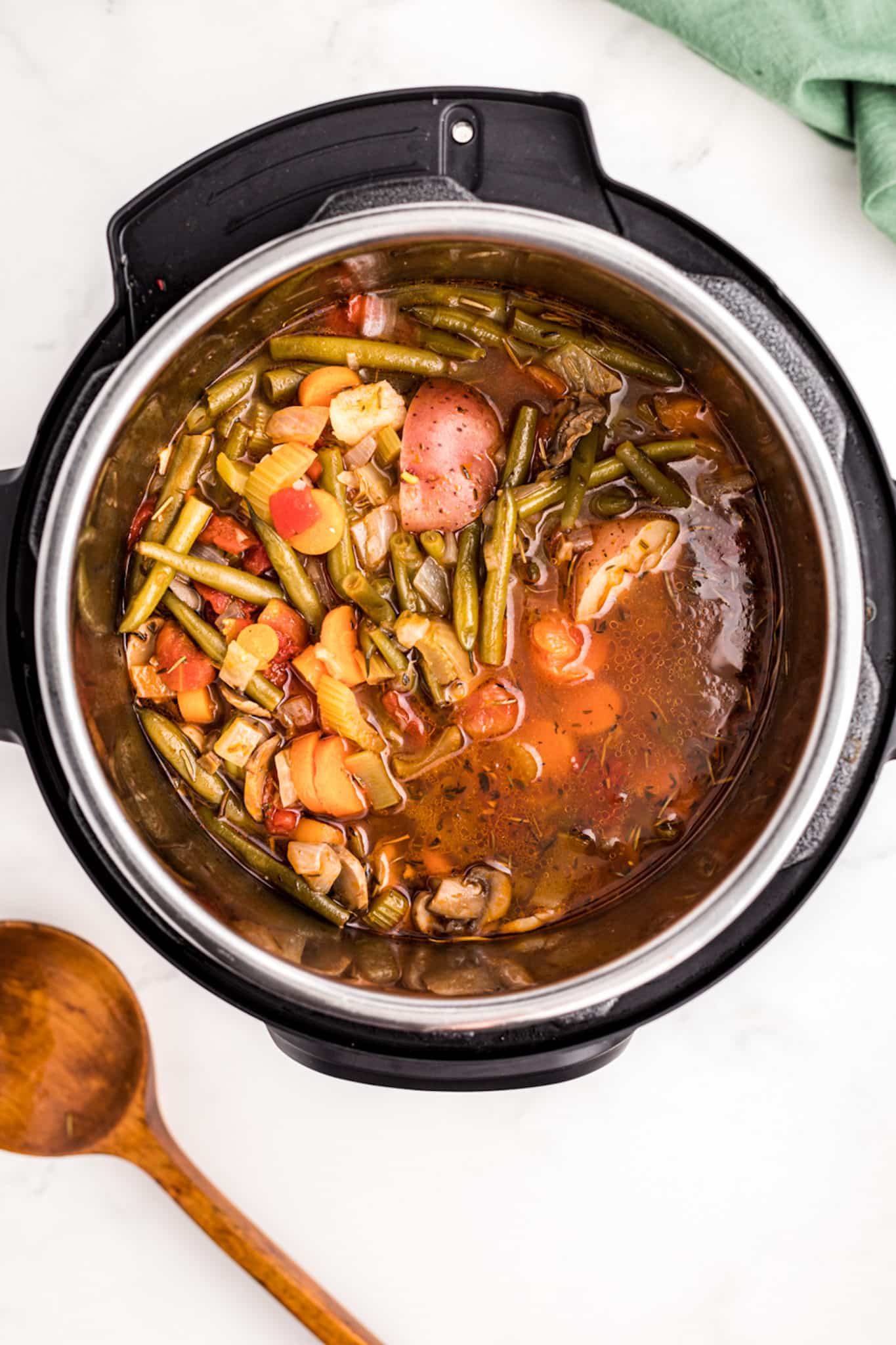 cooked veggie stew in pressure cooker.