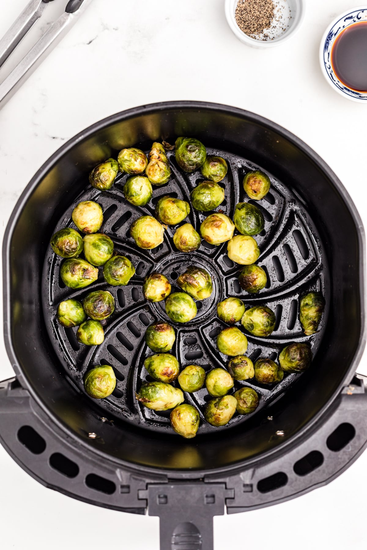 air fried frozen brussels sprouts in basket.