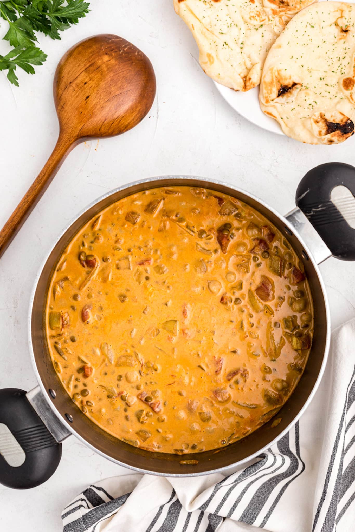 cooked chickpea lentil curry in pot.