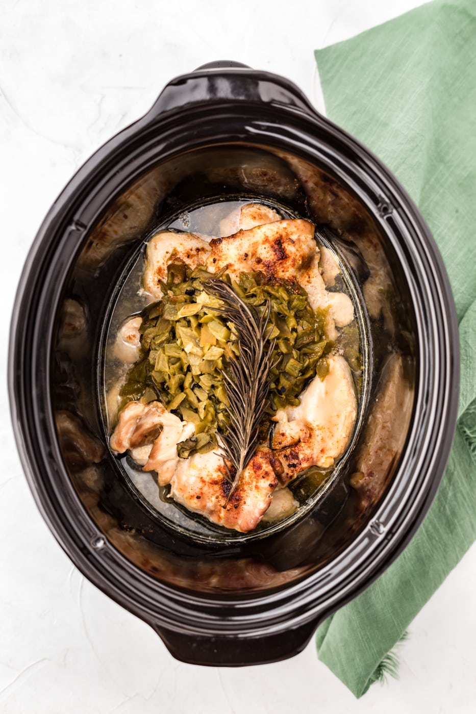 slow cooker with chicken and green chiles