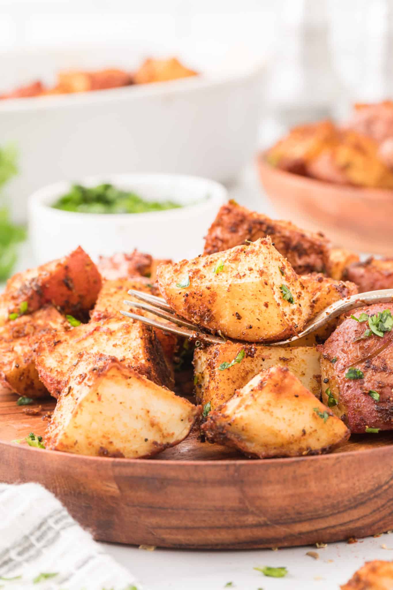a forkful of roasted potatoes.