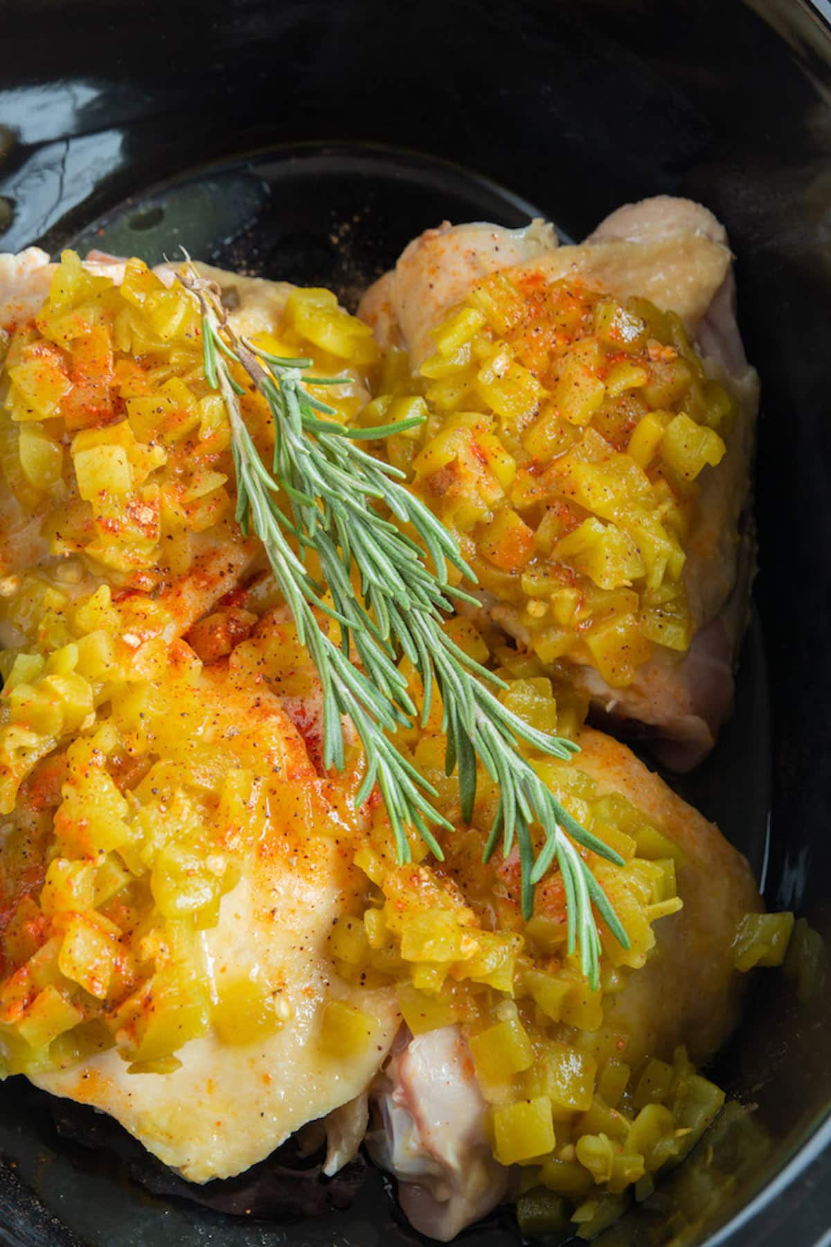 green chile chicken cooked in a crockpot.