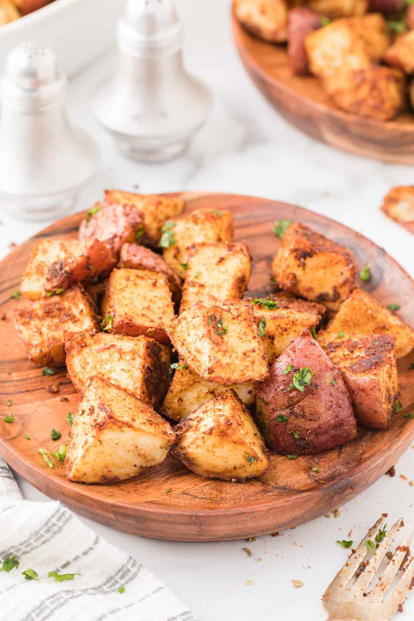mexican potatoes on a serving plate.