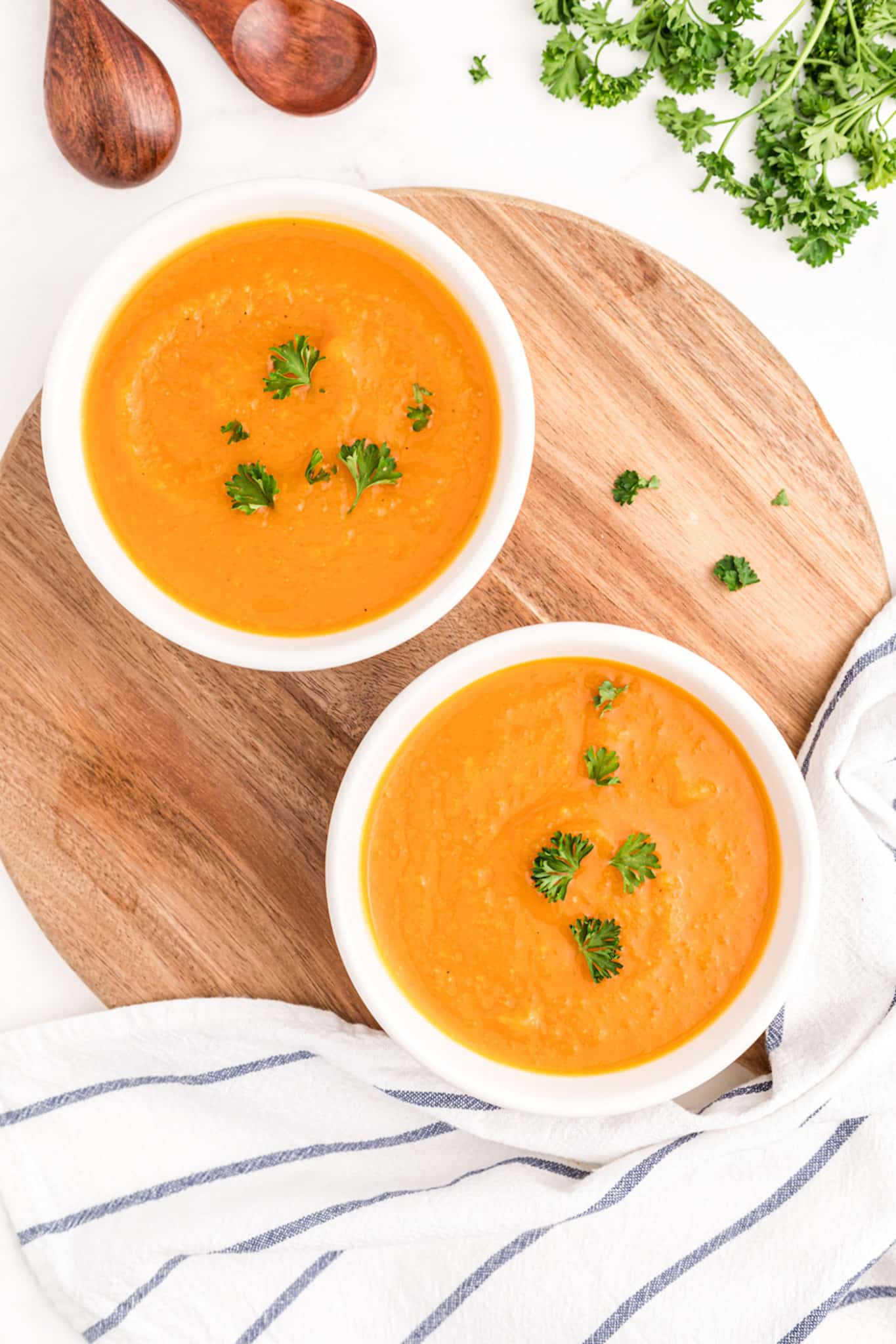 butternut squash soup with parsley on top.