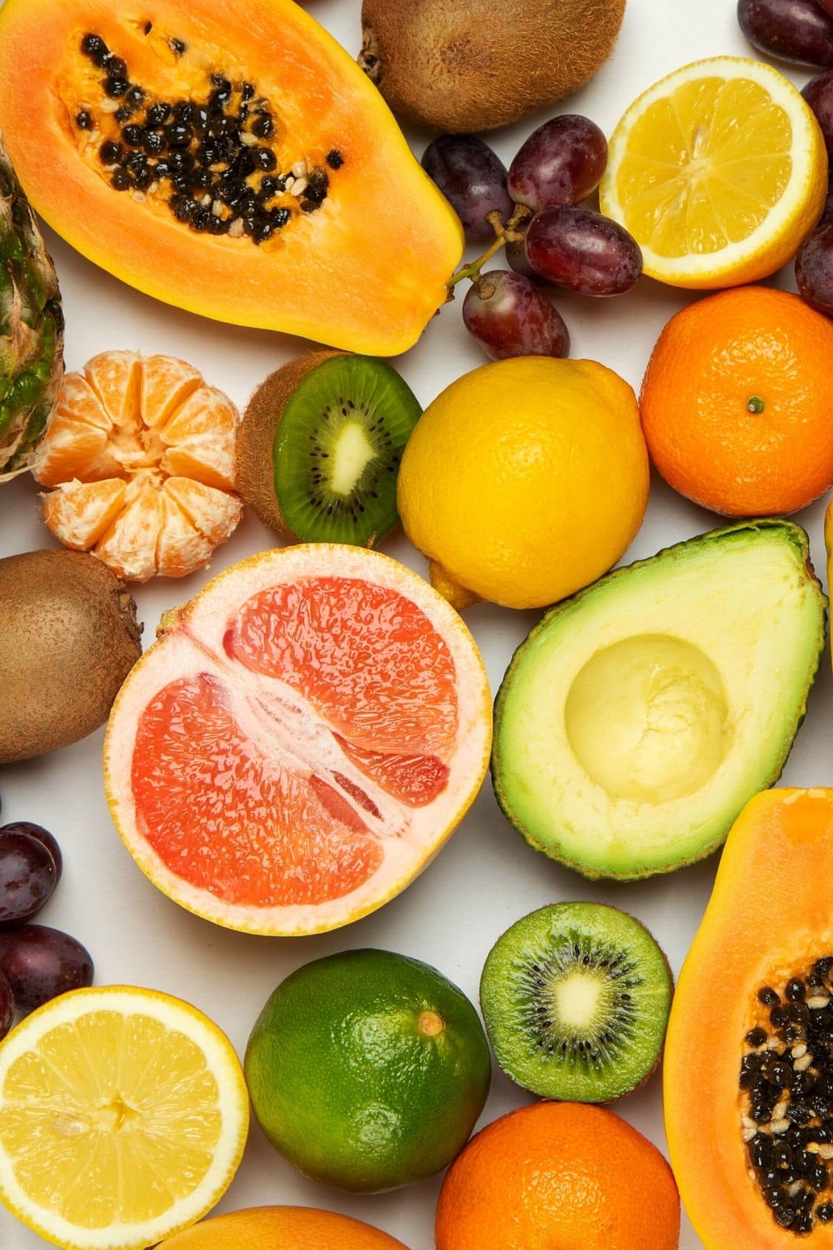 variety of colorful fresh fruits on a table.