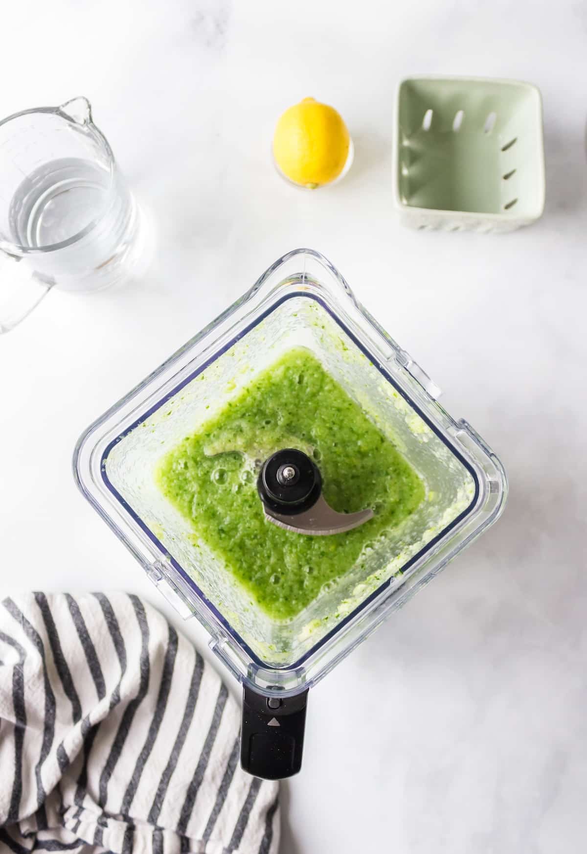 blended cucumber juice in blender pitcher.
