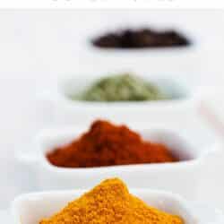 Bowls of Old Bay Seasoning and other spices.