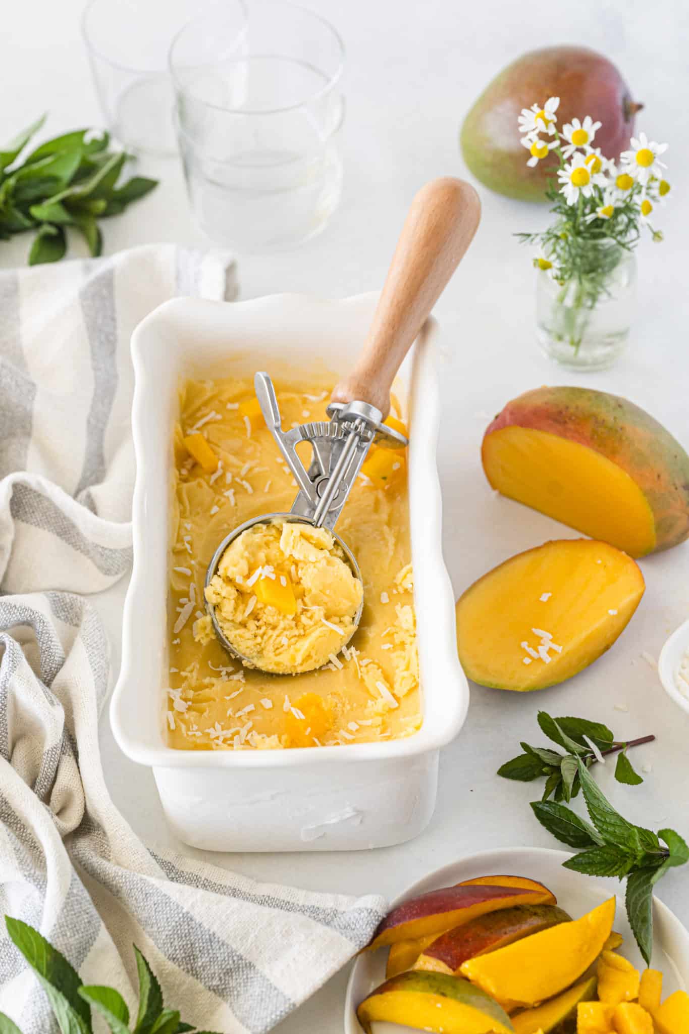 vegan mango ice cream in loaf pan.