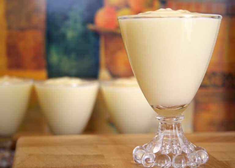 Glass serving cups of instant pudding.