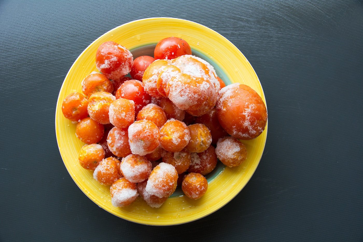 frozen tomatoes on a plate.