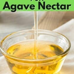 Agave nectar pouring into clear bowl on napkin and cutting board.