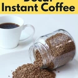 a jar of instant decaf coffee pouring out onto a white plate.
