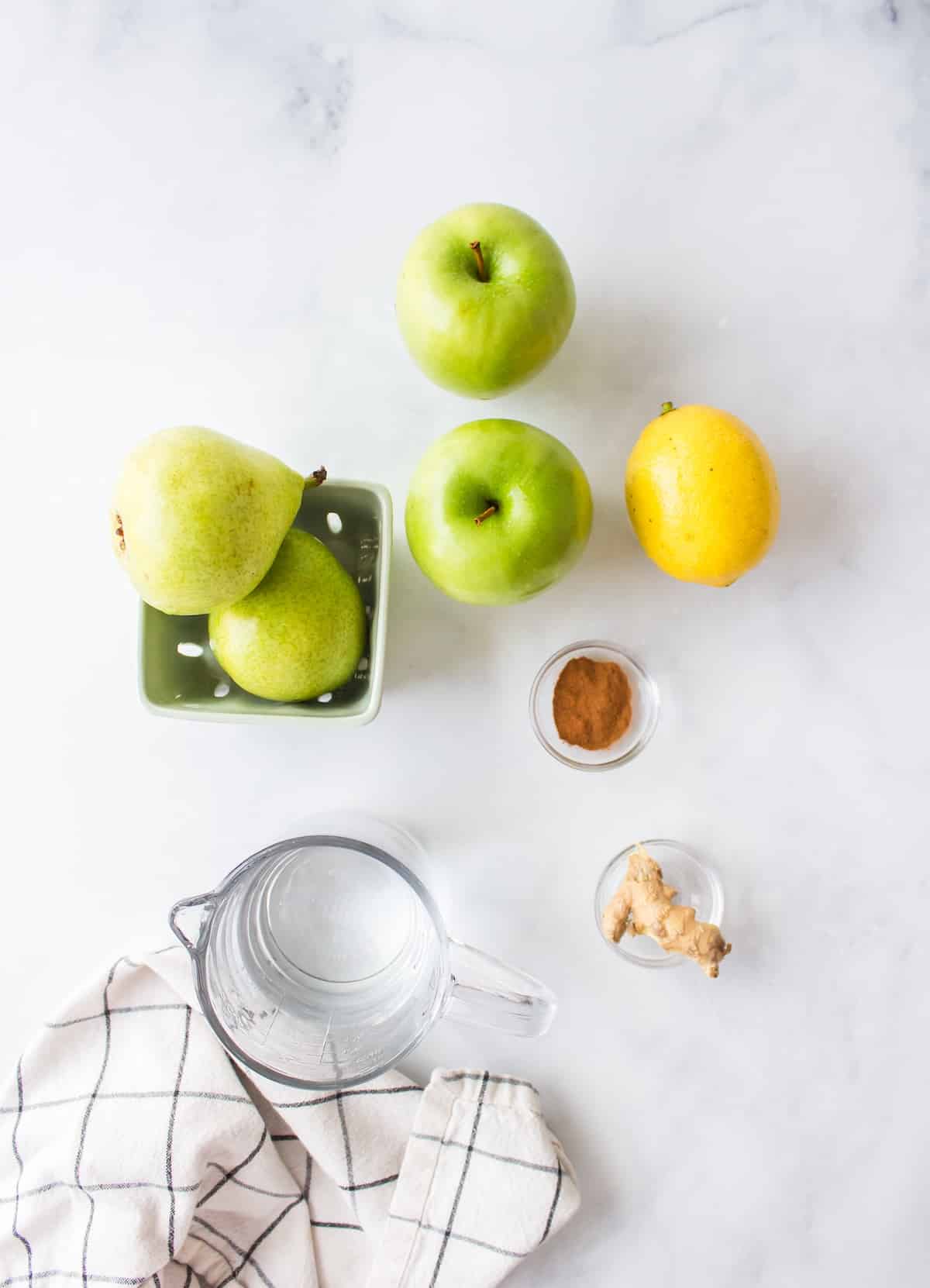 ingredients on table for making pear juice recipe.