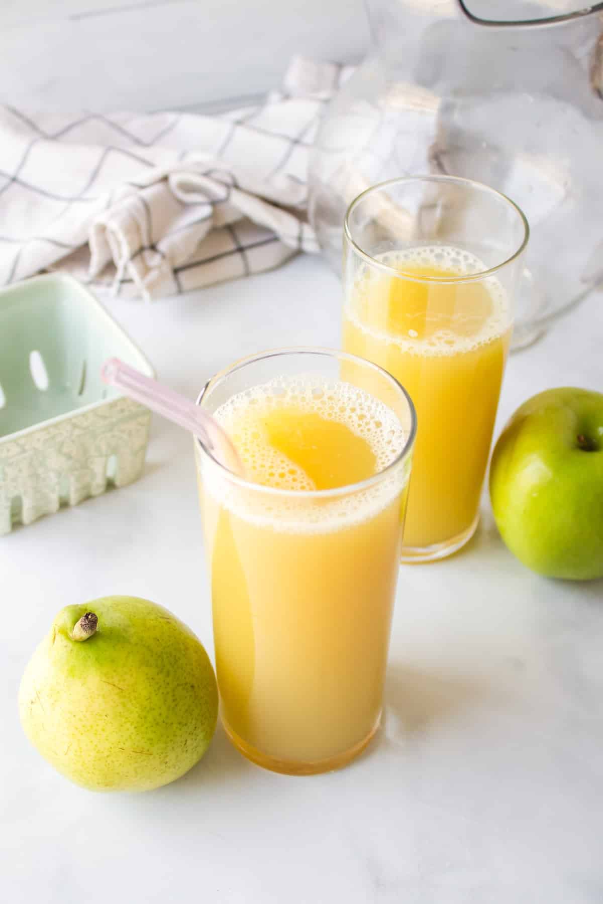 pear juice with straw.