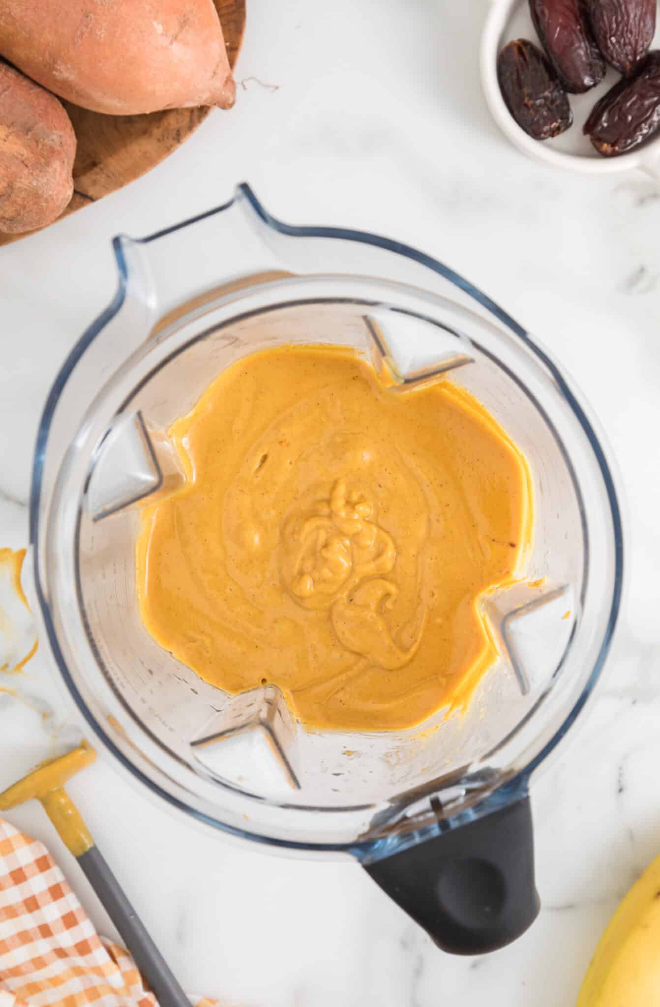 Sweet potato smoothie in the jar of a high-powered blender.