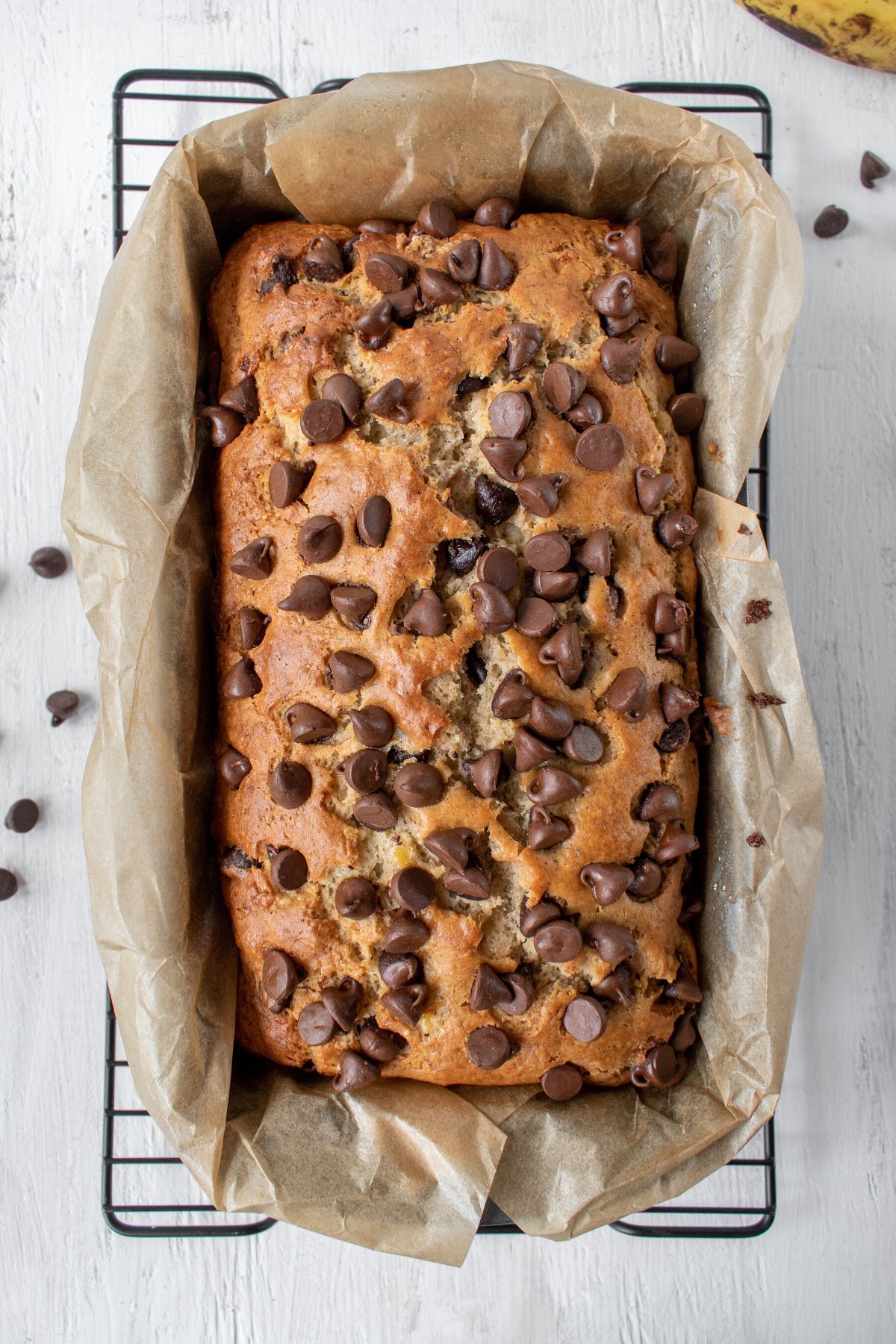 dairy free banana bread in pan with chocolate chips.