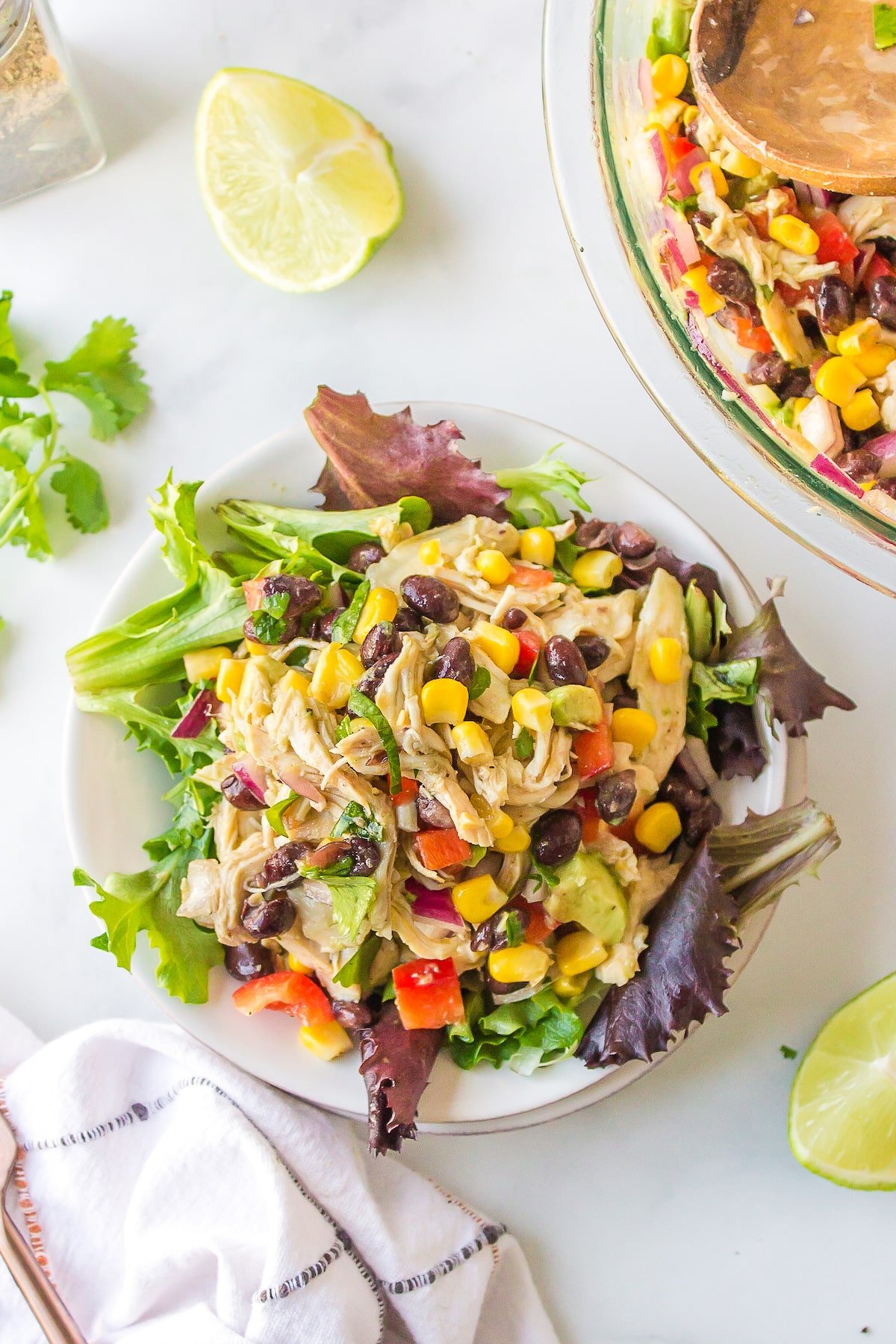 a bowl of Southwest Chicken Salad served over romaine lettuce.