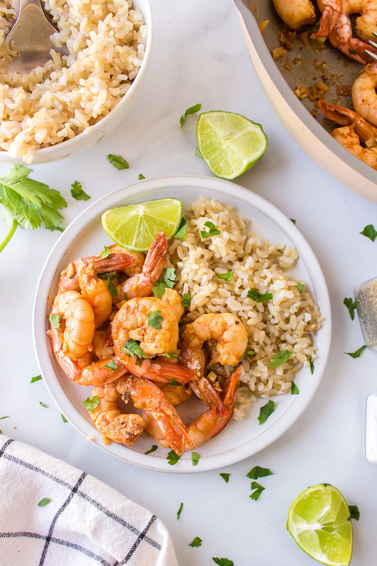 a plate of costco copycat cilantro lime shrimp with rice.