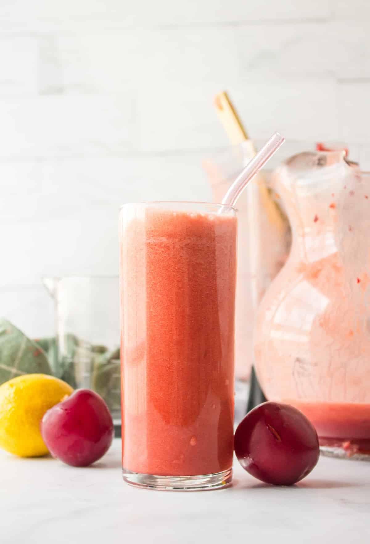 plum juice in glass.