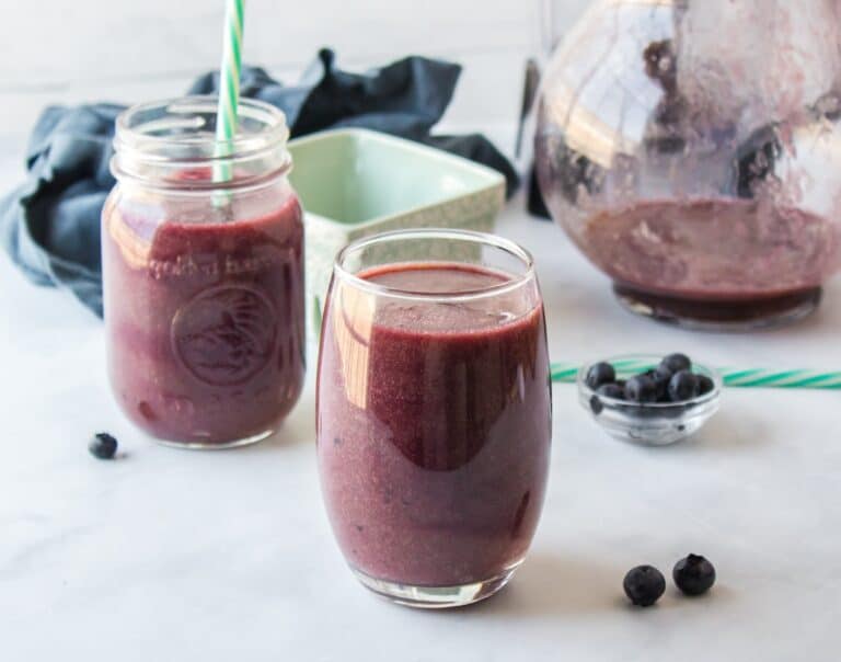 two glasses of fresh blueberry juice.