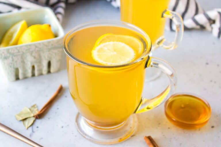 a glass of cinnamon and bay leaf tea.