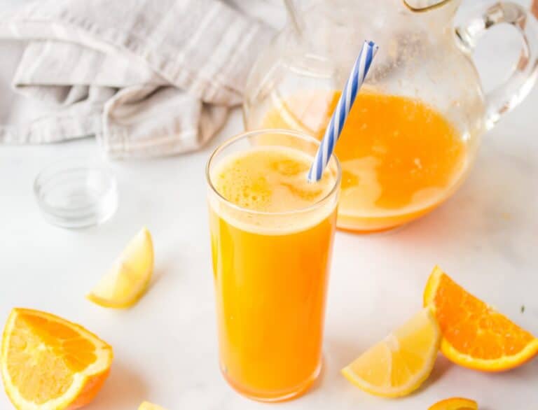 a glass of healthy yellow juice.