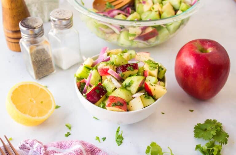 cucumber apple salad served in bowl.